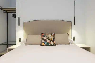 Cama o camas de una habitación en New Design Apartment - Private patio - Gallos 3