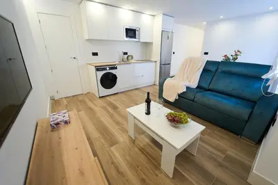 Una cocina o zona de cocina en 1ª planta C Apartamentos Juan Robledo Centro ciudad