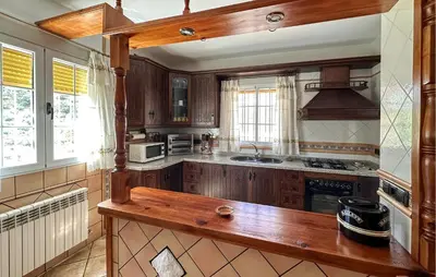 Una cocina o zona de cocina en Amazing Home In Algarinejo