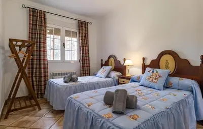 Cama o camas de una habitación en Amazing Home In Algarinejo