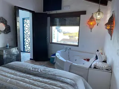 Cama o camas de una habitación en El Capricho, El Escondite de Martina