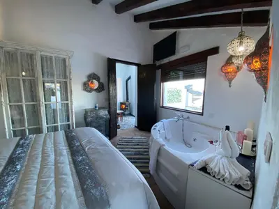 Cama o camas de una habitación en El Capricho, El Escondite de Martina