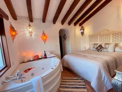 Cama o camas de una habitación en El Capricho, El Escondite de Martina
