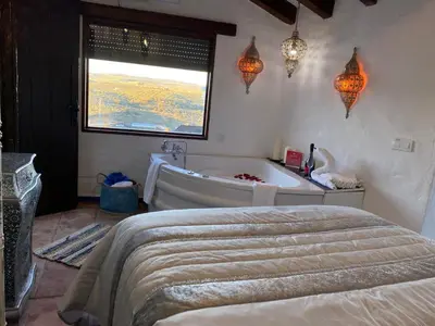 Cama o camas de una habitación en El Capricho, El Escondite de Martina