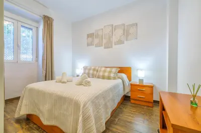 Cama o camas de una habitación en Altillo Sweet Home & Parking incluido
