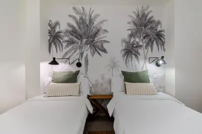 Cama o camas de una habitación en Apartamentos Cano y Cueto , Jardines de Murillo
