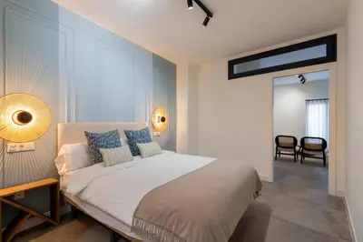 Cama o camas de una habitación en Apartamentos Cano y Cueto , Jardines de Murillo