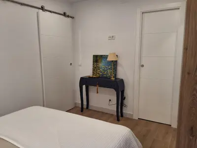 Cama o camas de una habitación en Templo Romano Luxury Home