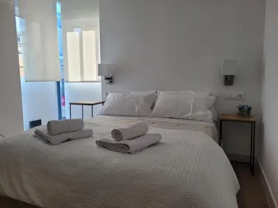 Cama o camas de una habitación en Templo Romano Luxury Home
