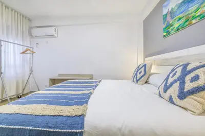 Cama o camas de una habitación en Apartamento Violeta & Centro