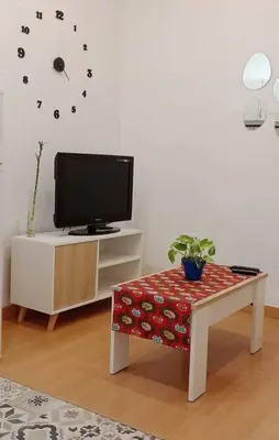 Una televisión o centro de entretenimiento en Hosfty Centro - Mirador San Marcos 1,1