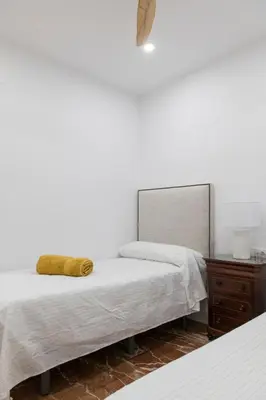 Cama o camas de una habitación en La Bodega Con Parking Gratis