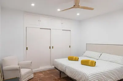 Cama o camas de una habitación en La Bodega Con Parking Gratis