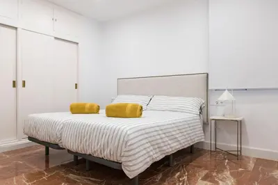 Cama o camas de una habitación en La Bodega Con Parking Gratis