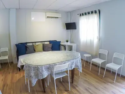 Zona de estar de CENTRO DE OCIO ALÚA Bungalows Camping Rafting Benamejí