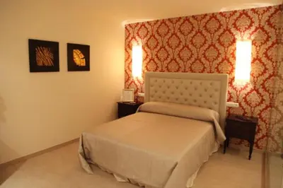 Cama o camas de una habitación en Hotel Restaurante Paneque