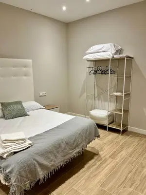 Cama o camas de una habitación en Jardines Suites GP