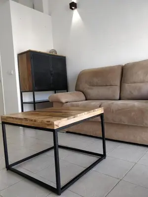 Una televisión o centro de entretenimiento en Apartamento Los Cascabeles