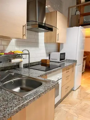 Una cocina o zona de cocina en InHome Central Studio