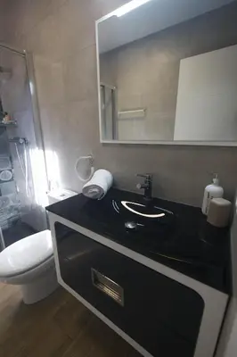 Un baño de Apartamentos turísticos ilusiones