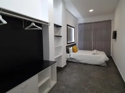 Cama o camas de una habitación en CARMELO APARTAMENTo