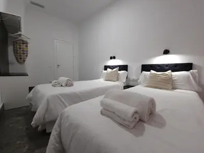 Cama o camas de una habitación en CARMELO APARTAMENTo