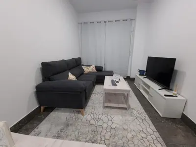 Una televisión o centro de entretenimiento en CARMELO APARTAMENTo