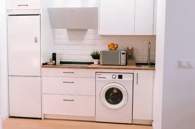Una cocina o zona de cocina en Optimum Sevilla Loft Boutique