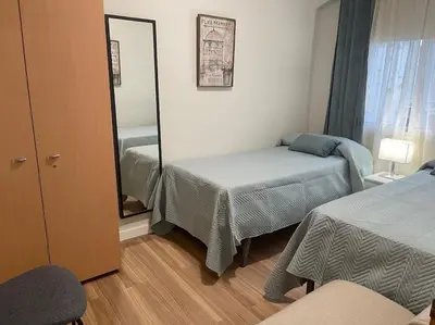 Cama o camas de una habitación en apartamento lux nervión