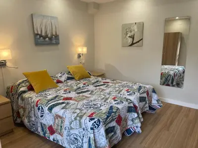 Cama o camas de una habitación en apartamento lux nervión