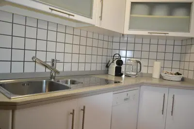 Una cocina o zona de cocina en Sunshine San Fernando