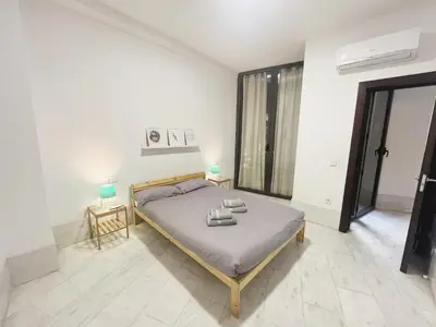 Cama o camas de una habitación en Center Sevilla Confort 5