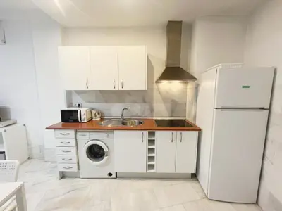 Una cocina o zona de cocina en Center Sevilla Confort 5