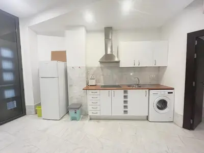 Una cocina o zona de cocina en Center Sevilla Confort 6