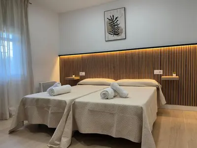 Cama o camas de una habitación en Casa rural Los Girasoles