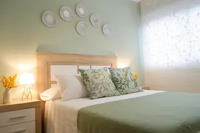 Cama o camas de una habitación en Confort a un paso del Casco Histórico, parking gratis en el mismo edificio