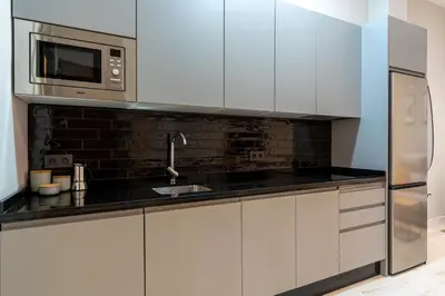 Una cocina o zona de cocina en RentalSevilla Plaza de San Quintín