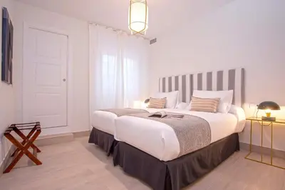 Cama o camas de una habitación en Genteel Home Teatro Góngora
