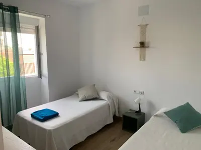Cama o camas de una habitación en El Rincon de los Girasoles