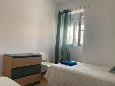 Cama o camas de una habitación en El Rincon de los Girasoles