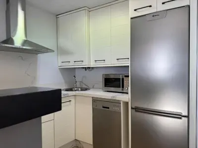 Una cocina o zona de cocina en Apartamento San Basilio Bookish Place