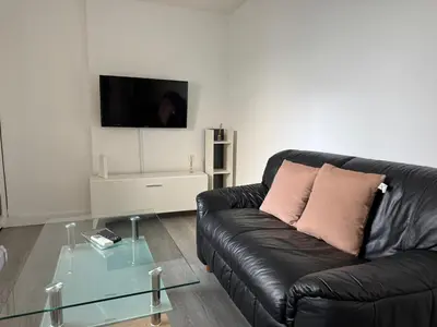 Una televisión o centro de entretenimiento en Apartamento Chaparro 6