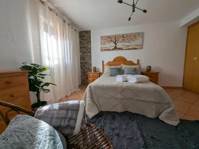 Cama o camas de una habitación en Casa Rural el Olivar Chumi