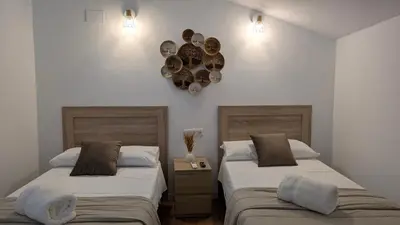 Cama o camas de una habitación en Casa Rural el Olivar Chumi