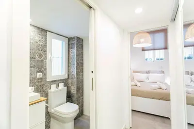 Cama o camas de una habitación en Amplio apartamento de diseño precioso con parking incluido en pleno centro