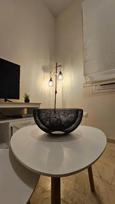 Una televisión o centro de entretenimiento en Apartamento Menina San Pedro