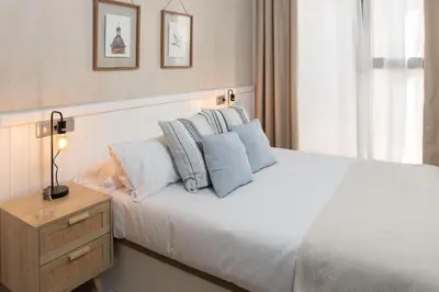 Cama o camas de una habitación en Alohamundi Niña