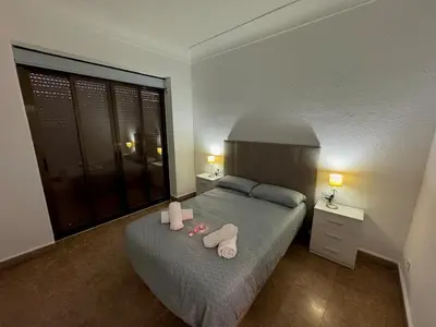 Cama o camas de una habitación en El Balcón de María Luisa