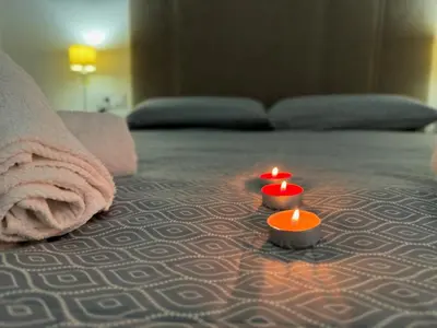 Cama o camas de una habitación en El Balcón de María Luisa