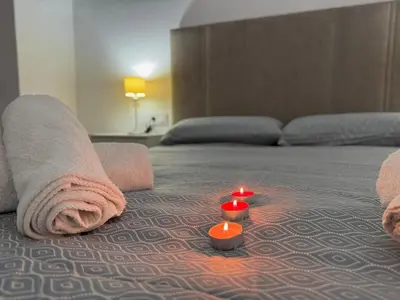 Cama o camas de una habitación en El Balcón de María Luisa